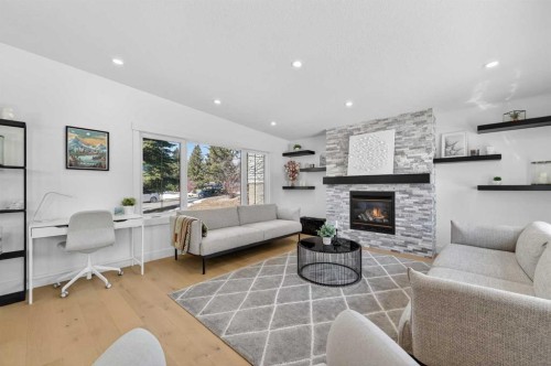 268 Silver Brook Way Nw, Calgary, AB - Indoor Photo Showing Living Room With Fireplace