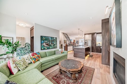 3705 2 Avenue Sw, Calgary, AB - Indoor Photo Showing Living Room With Fireplace