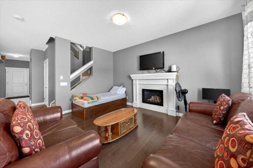 72 Redstone Drive Ne, Calgary, AB - Indoor Photo Showing Living Room With Fireplace