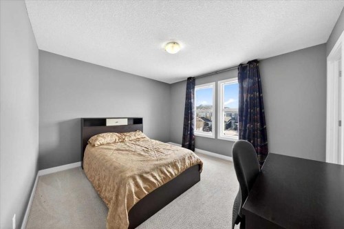 72 Redstone Drive Ne, Calgary, AB - Indoor Photo Showing Bedroom