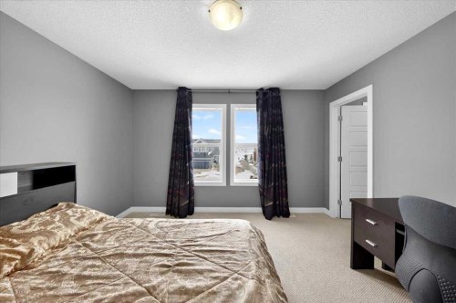 72 Redstone Drive Ne, Calgary, AB - Indoor Photo Showing Bedroom