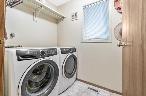 124 Catalina Place Ne, Calgary, AB - Indoor Photo Showing Laundry Room