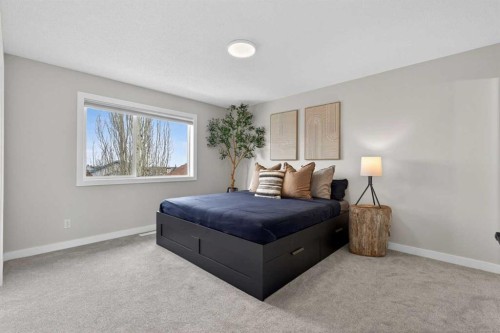 10 Somerglen Crescent Sw, Calgary, AB - Indoor Photo Showing Bedroom