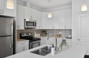 190 River Heights Crescent, Cochrane, AB  - Indoor Photo Showing Kitchen With Stainless Steel Kitchen With Double Sink With Upgraded Kitchen 