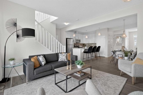 190 River Heights Crescent, Cochrane, AB - Indoor Photo Showing Living Room