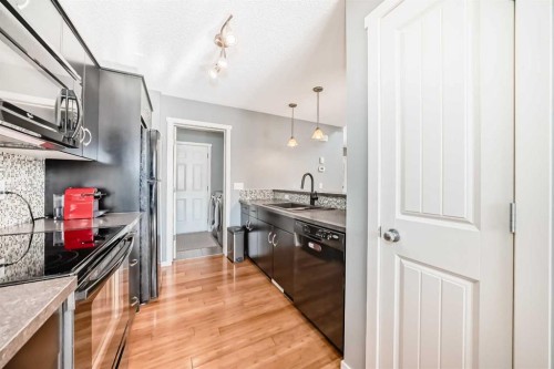 136 Sage Valley Drive Nw, Calgary, AB - Indoor Photo Showing Kitchen With Upgraded Kitchen
