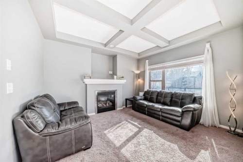 136 Sage Valley Drive Nw, Calgary, AB - Indoor Photo Showing Living Room With Fireplace