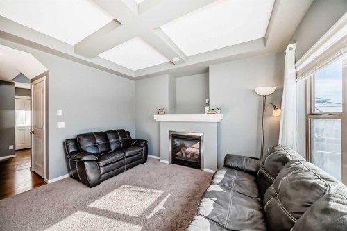 136 Sage Valley Drive Nw, Calgary, AB - Indoor Photo Showing Living Room With Fireplace