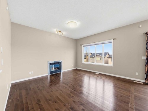 32 Panatella Parade Nw, Calgary, AB - Indoor With Fireplace