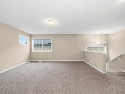 32 Panatella Parade Nw, Calgary, AB - Indoor Photo Showing Other Room