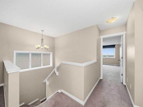 32 Panatella Parade Nw, Calgary, AB - Indoor Photo Showing Other Room