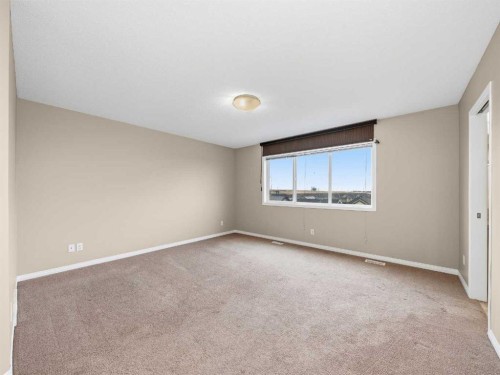 32 Panatella Parade Nw, Calgary, AB - Indoor Photo Showing Other Room