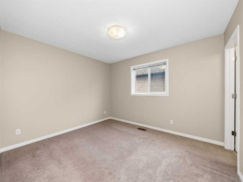 32 Panatella Parade Nw, Calgary, AB - Indoor Photo Showing Other Room