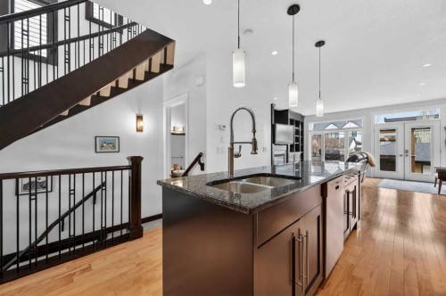 1924 48 Avenue Sw, Calgary, AB - Indoor Photo Showing Kitchen With Double Sink With Upgraded Kitchen