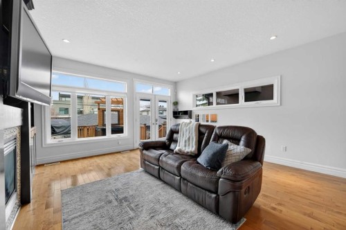 1924 48 Avenue Sw, Calgary, AB - Indoor Photo Showing Living Room With Fireplace