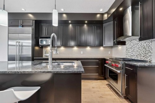 1924 48 Avenue Sw, Calgary, AB - Indoor Photo Showing Kitchen With Double Sink With Upgraded Kitchen