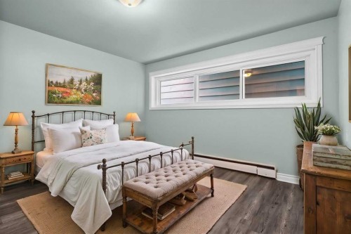 67 Hooke Road Sw, Calgary, AB - Indoor Photo Showing Bedroom