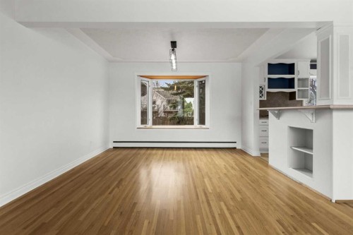 67 Hooke Road Sw, Calgary, AB - Indoor Photo Showing Living Room
