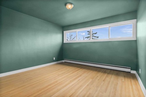 67 Hooke Road Sw, Calgary, AB - Indoor Photo Showing Other Room