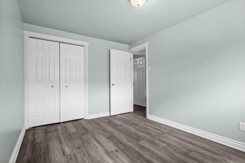 67 Hooke Road Sw, Calgary, AB - Indoor Photo Showing Other Room