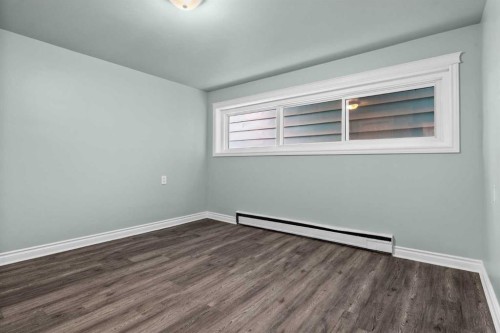 67 Hooke Road Sw, Calgary, AB - Indoor Photo Showing Other Room