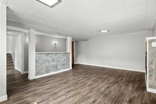 67 Hooke Road Sw, Calgary, AB - Indoor Photo Showing Other Room