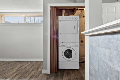 67 Hooke Road Sw, Calgary, AB - Indoor Photo Showing Laundry Room