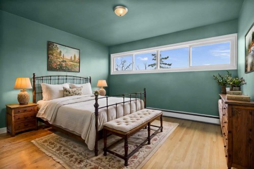 67 Hooke Road Sw, Calgary, AB - Indoor Photo Showing Bedroom