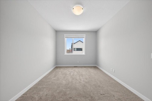 123-123 Redstone Crescent Ne, Calgary, AB - Indoor Photo Showing Other Room