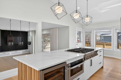 42 Sunvista Crescent Se, Calgary, AB - Indoor Photo Showing Kitchen With Upgraded Kitchen