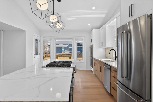 42 Sunvista Crescent Se, Calgary, AB - Indoor Photo Showing Kitchen With Upgraded Kitchen