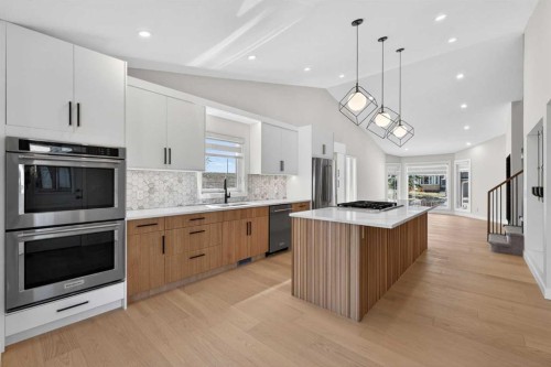 42 Sunvista Crescent Se, Calgary, AB - Indoor Photo Showing Kitchen With Upgraded Kitchen