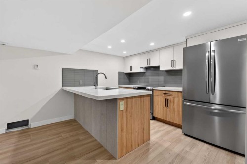 42 Sunvista Crescent Se, Calgary, AB - Indoor Photo Showing Kitchen With Upgraded Kitchen