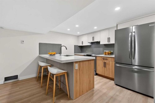 42 Sunvista Crescent Se, Calgary, AB - Indoor Photo Showing Kitchen With Upgraded Kitchen