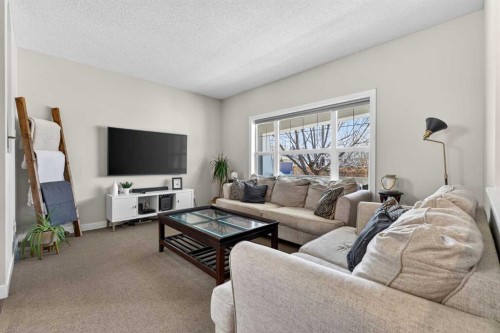 50 Silverado Plains Circle Sw, Calgary, AB - Indoor Photo Showing Living Room