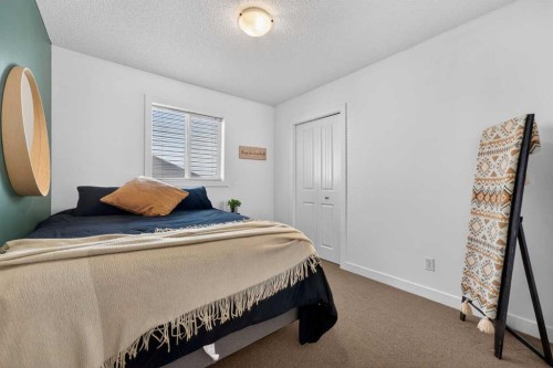 50 Silverado Plains Circle Sw, Calgary, AB - Indoor Photo Showing Bedroom