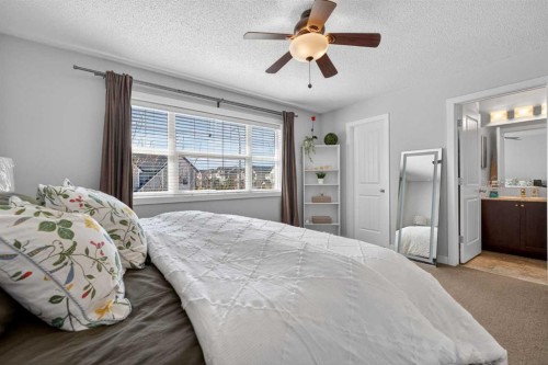 50 Silverado Plains Circle Sw, Calgary, AB - Indoor Photo Showing Bedroom