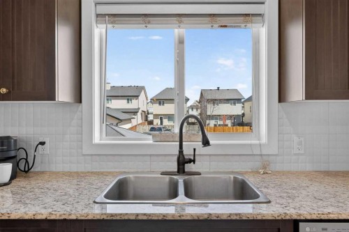 50 Silverado Plains Circle Sw, Calgary, AB - Indoor Photo Showing Kitchen With Double Sink