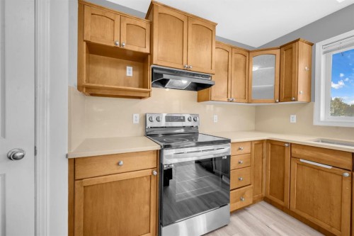 171 Willowbrook Drive Nw, Airdrie, AB - Indoor Photo Showing Kitchen