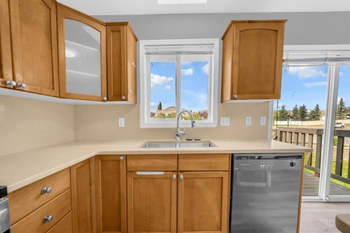 171 Willowbrook Drive Nw, Airdrie, AB - Indoor Photo Showing Kitchen With Double Sink