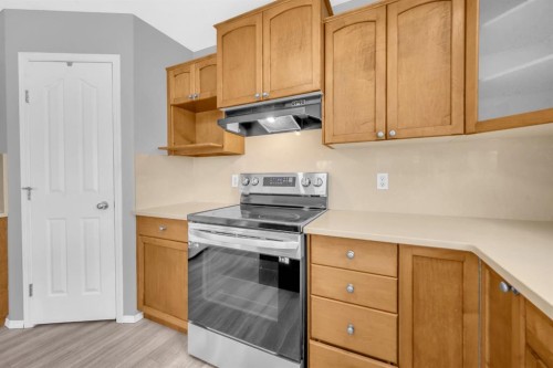 171 Willowbrook Drive Nw, Airdrie, AB - Indoor Photo Showing Kitchen