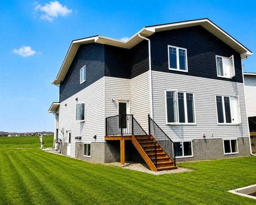 1903 Mccaskill Drive, Crossfield, AB - Outdoor With Exterior