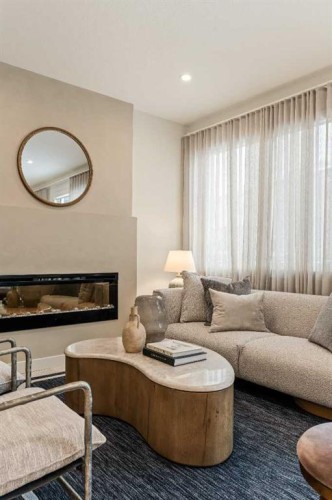 103 Silver Spruce Grove, Calgary, AB - Indoor Photo Showing Living Room With Fireplace