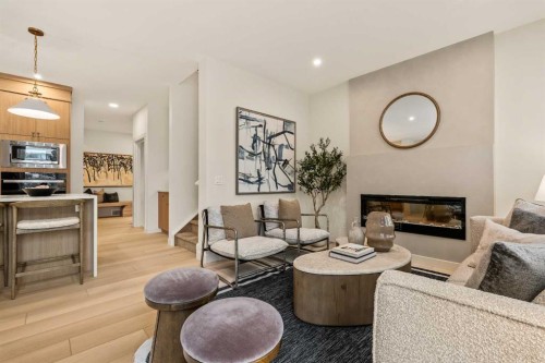103 Silver Spruce Grove, Calgary, AB - Indoor Photo Showing Living Room With Fireplace