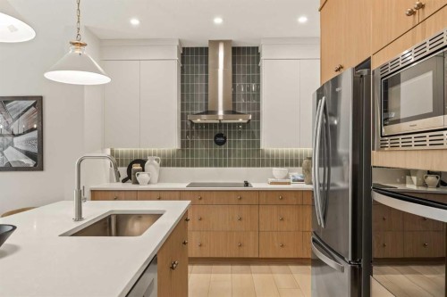103 Silver Spruce Grove, Calgary, AB - Indoor Photo Showing Kitchen