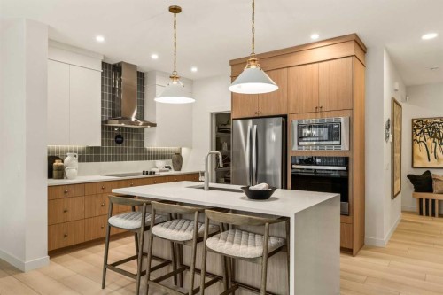 103 Silver Spruce Grove, Calgary, AB - Indoor Photo Showing Kitchen With Upgraded Kitchen
