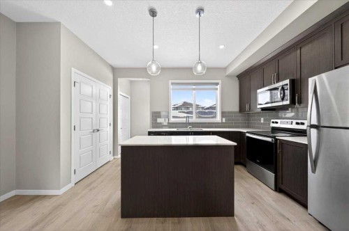 168 Corner Meadows Way Ne, Calgary, AB - Indoor Photo Showing Kitchen With Upgraded Kitchen
