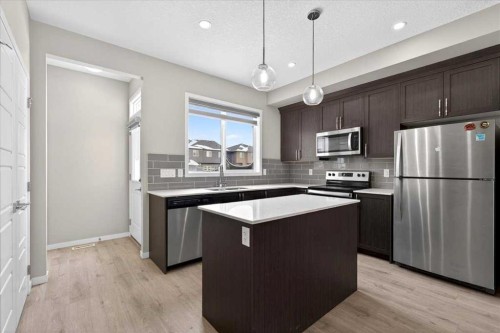 168 Corner Meadows Way Ne, Calgary, AB - Indoor Photo Showing Kitchen With Upgraded Kitchen
