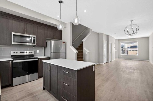 168 Corner Meadows Way Ne, Calgary, AB - Indoor Photo Showing Kitchen With Upgraded Kitchen