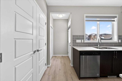 168 Corner Meadows Way Ne, Calgary, AB - Indoor Photo Showing Kitchen With Double Sink